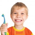 Child with toothbrush