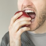 strong teeth eating apple