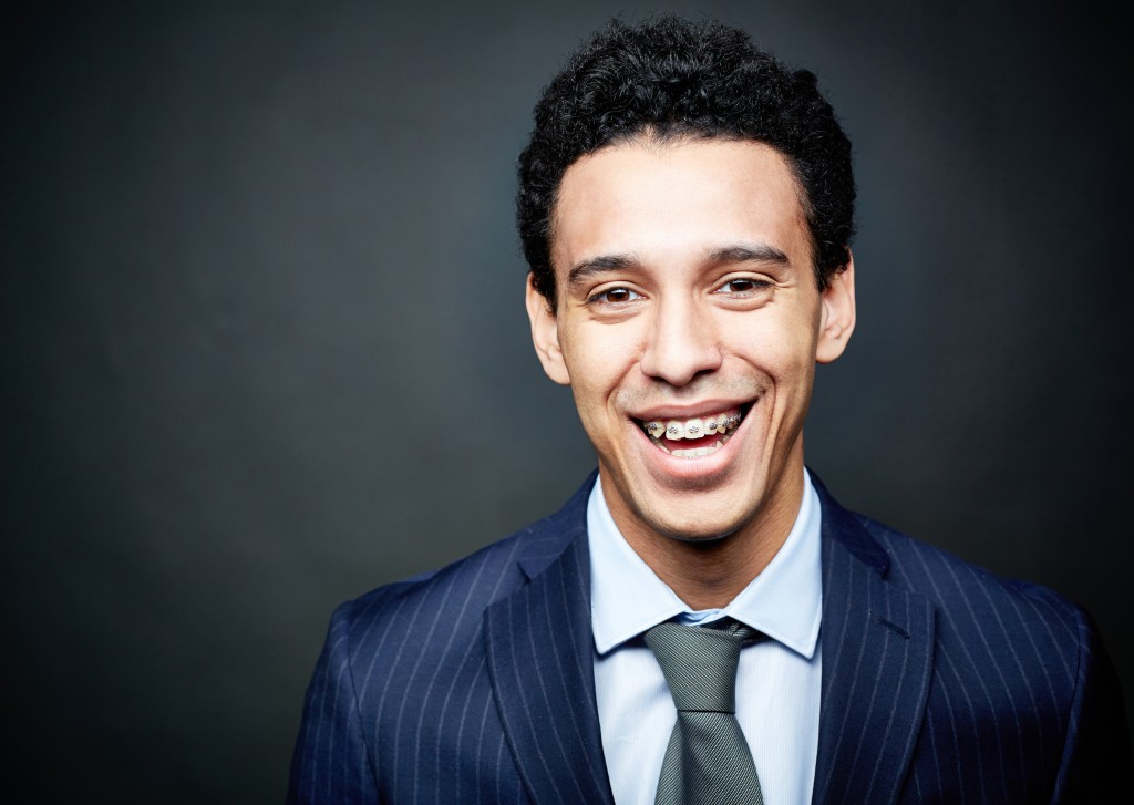 Man in a suit with braces