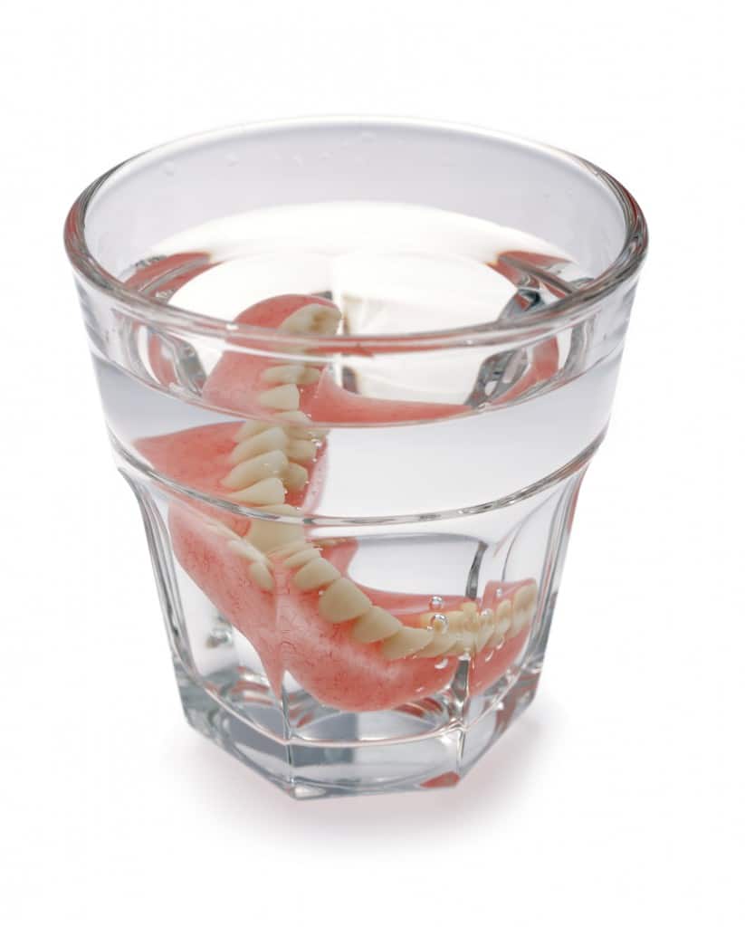 Dentures in a glass of water