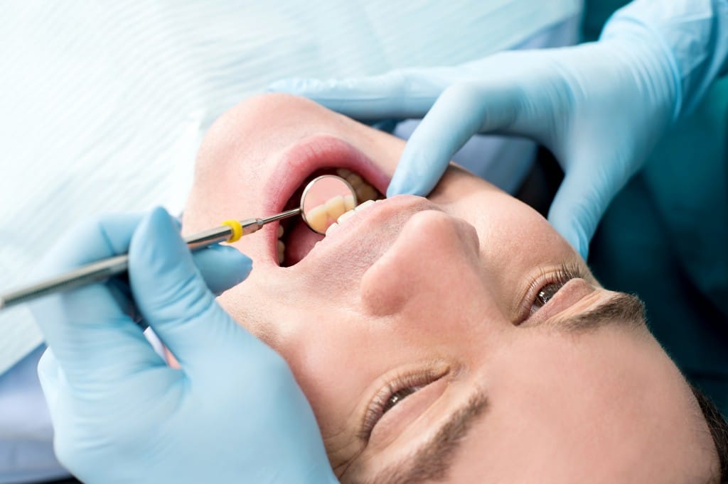 Man receiving dental care