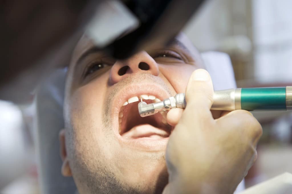 Man receiving dental care