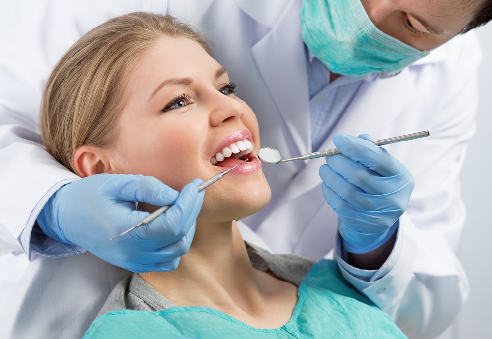 woman receiving dental care with financing in las vegas