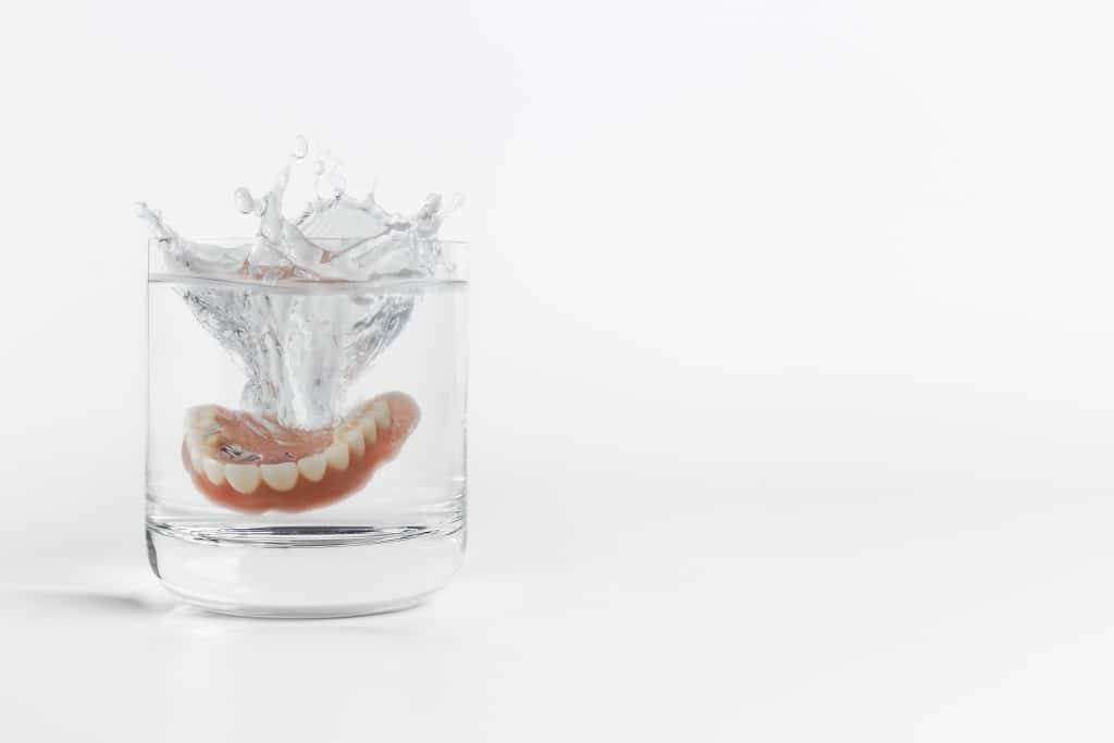 Dentures in a glass of water